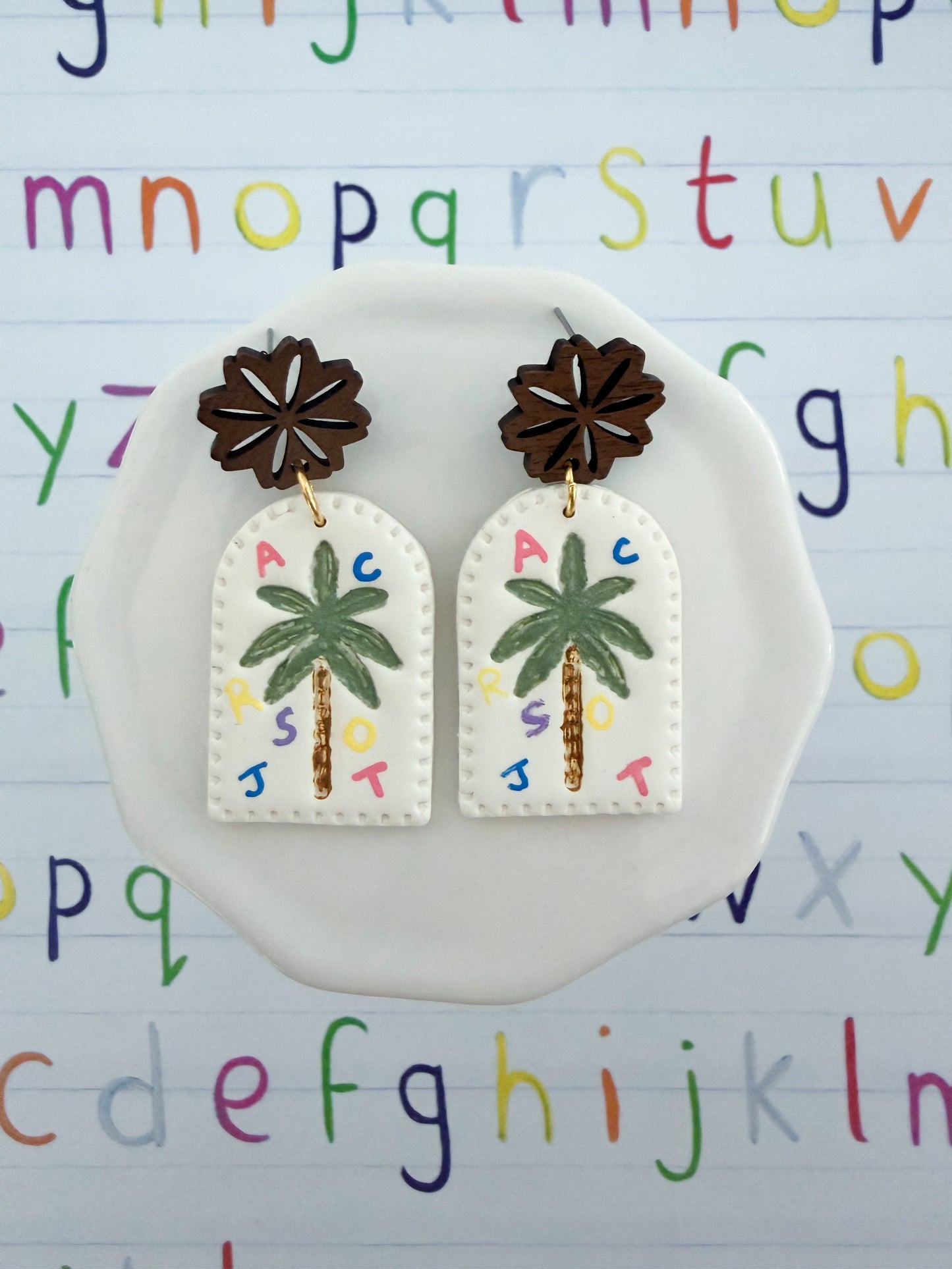 Alphabet Tree Dangles